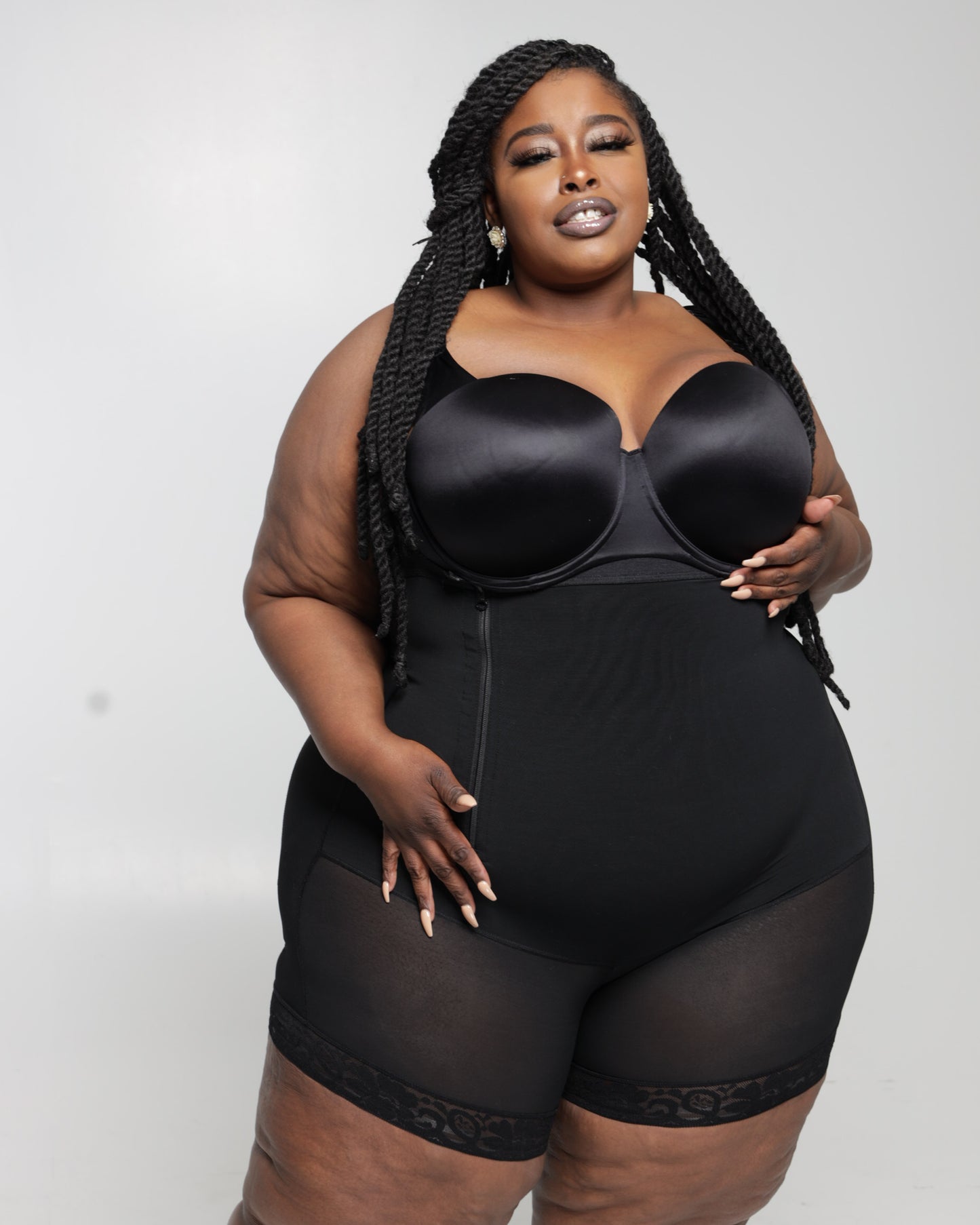 Queen Faja undergarment with removable straps.